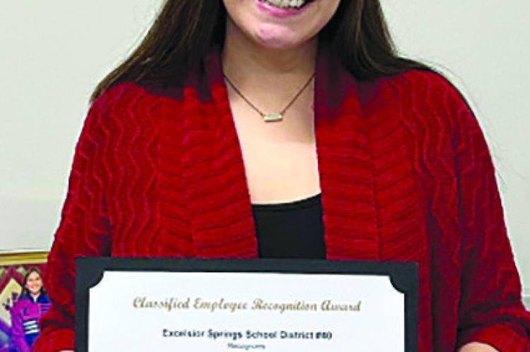 Teacher, soccer team recognized by school board