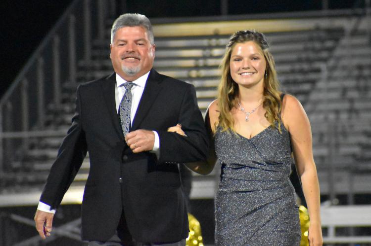 Senior princess candidate Elizabeth Casey is escorted by her father, John Casey. (Photo by Christi Rice)