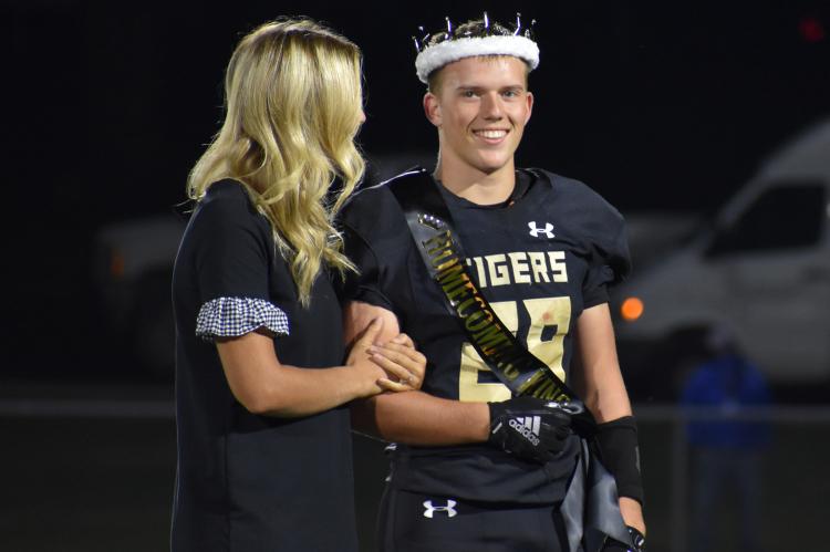 Gunner Zirjacks wins Homecoming King, sharing the moment with his sister Marley Zirjacks. (Photo by Christi Rice)