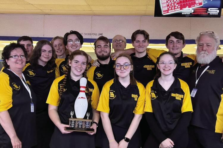 MEMBERS OF the Excelsior Springs High School bowling club display their trophy from December tournament competition at Summit Lanes in Lee’s Summit. From left, front row, coach Teresa Ferrell, Olivia Deere, Olivia Smith, Quinlynn Davis; back row, Kamdyn McAndrews, Brody Hurla, Colt Bowman, Cole Dickey, Joshua Oldham, coach Jerry Ferrell, David Falconer, Andrew DeOrnellis. coach Sam Stanton. SARAH OLDHAM | Submitted
