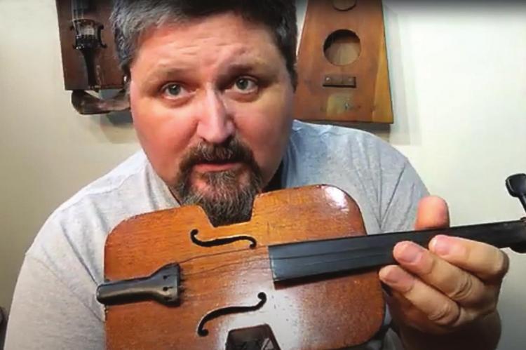 SHANE SPEAL operates the Cigar Box Museum in New Alexandria, Pennsylvania, and posts instructional videos, from which this image is taken.