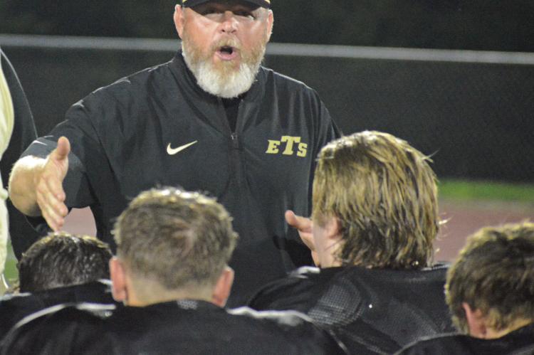 EXCELSIOR SPRINGS varsity football coach Jake Danneman, shown talking to his players after this year’s Black and Gold Scrimmage, seeks to build the Tigers into a team on the upswing that will give opponents a fight all game long. SHAWN RONEY | Staff