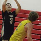 OWEN O’DELL (left) attempts a shot during Excelsior Springs’ summer-league game with Penney of Hamilton. More boys basketball coverage on page 8. SHAWN RONEY | Staff