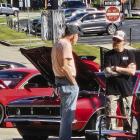 CAR ENTHUSIASTS CHECK out the lineup at the 11th annual car show hosted by Excelsior Springs American Legion Post 236. Proceeds from the event benefit the post and local veterans. MIRANDA JAMISON | Staff