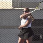 OLIVIA DEERE watches one of her forehand shots during Excelsior Springs’ varsity girls tennis dual with Chillicothe. SHAWN RONEY | Staff