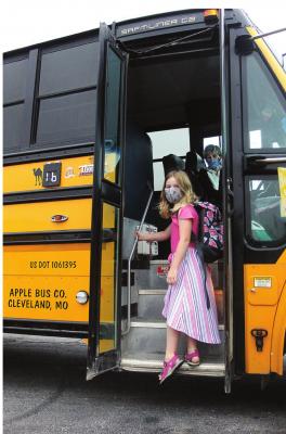 J.C. VENTIMIGLIA | Staff STUDENT Averie Goetz, 8, rides on a bus that has been safety inspected by the Missouri Highway Patrol.