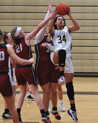 EXCELSIOR SPRINGS junior Lillian Mawby goes up for two of her six points in an MRVC West Division home win over Warrensburg. TIM HARLAN | Submitted Photo