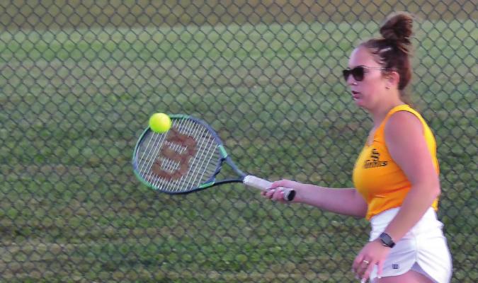 SADIE MOORE hits a forehand shot during her Oct. 1 singles win. DUSTIN DANNER | Staff