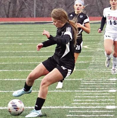 ABBY RASH gains control of the ball during Excelsior Springs’ 5-1 March 26 home loss to Fort Osage in varsity girls soccer. Rash and her teammates were 1-4 overall entering Thursday’s home meeting with Grandview. DUSTIN DANNER | Staff