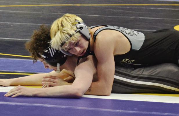 RYNE MARCUM, an Excelsior Springs junior, maneuvers on top during his first-round victory in Class 2 state competition last week at Mizzou Arena in Columbia. DUSTIN DANNER | Staff
