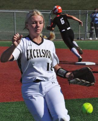 IN A streak-filled season that includes a 10-game losing skid, Excelsior Springs perseveres and reaches the Class 4 District 8 title game, where the Tigers face Platte County. Alyssa Dean follows a bloop hit in that final ballgame. SHAWN RONEY | Staff
