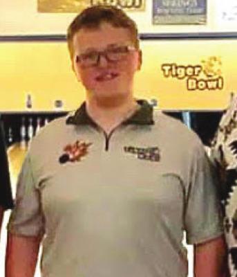GANNON DAVIS bowls his way to an 891 series and a first-place finish in a six-game youth series at Tiger Bowl in Excelsior Springs. Submitted photo