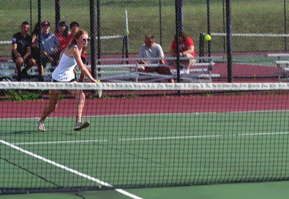 JUNIOR EMMA KERN approaches the ball to attempt a forehand shot. DUSTIN DANNER | Staff