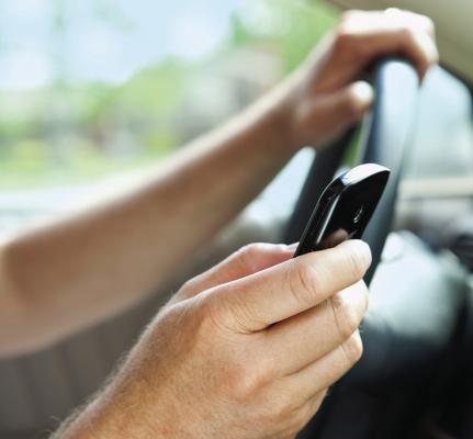 Law restricts drivers from phone