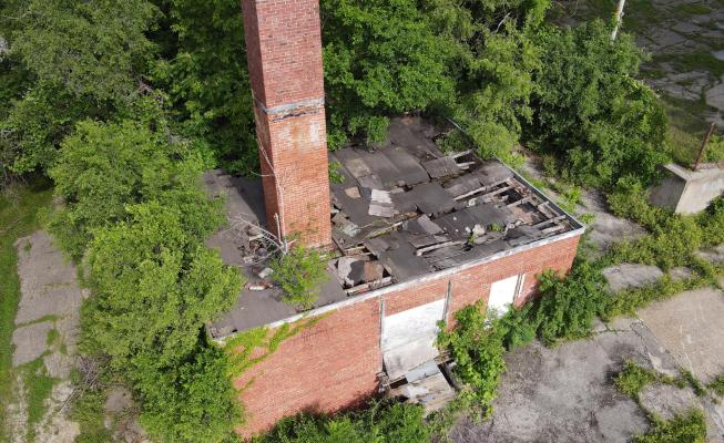 WYMAN SCHOOL’S power plant will be demolished beginning later this month. Roof damage and deteriorating conditions of the structure have prompted its removal. The structure is 109 years old. BRIAN RICE | Staff