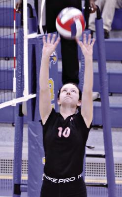 REESE ROBERTS makes a set pass for a kill during Excelsior Springs’ sweep of Ruskin last week in Kansas City. DUSTIN DANNER | Staff