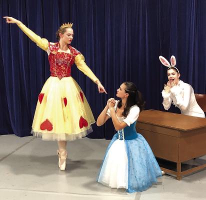 BALLET NORTH students Rase Lagergren (from left), Mai-Linh North and Aliyah Emmons dress in costume for the “Alice’s Adventures in Wonderland” ballet. BALLET NORTH STUDIO | Submitted
