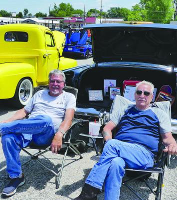 DAN RULE (left) and John Spick sit with their vehicles, available to answer questions and chat with viewers, at the Second Annual Fast and Furious Car Show. See page 8 for more photos. ELIZABETH BARNT | Staff