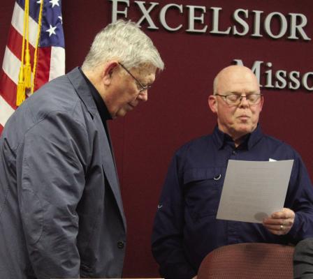 COUNCILMAN JOHN MCGOVERN (left) is presented with the Older Americans Month proclamation for 2024 from Mayor Mark Spohn.