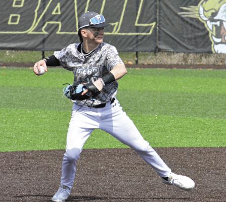 SHORTSTOP RYNE MARCUM rears back to throw to first early in the second game of Excelsior Springs’ March 25 home doubleheader with Cameron. SHAWN RONEY | Staff