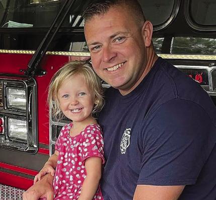 NEW ESFD Assistant Fire Chief Joe Cline (right) is shown here with his daughter, Elli Cline. Cline started his new position earlier this week. Submitted
