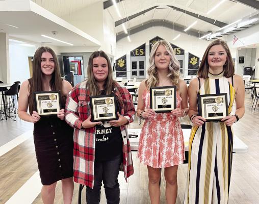 MEET THIS YEAR’S award recipients following Tuesday’s banquet at Excelsior Springs High School for the girls tennis team. Pictured are Shelby Stodden, Most Improved Player; Malaya Tedesco, Newcomer of the Year; Lauren Mueller, Hustle Award; and Anna Selby, Most Valuable Player. DUSTIN DANNER | Staff