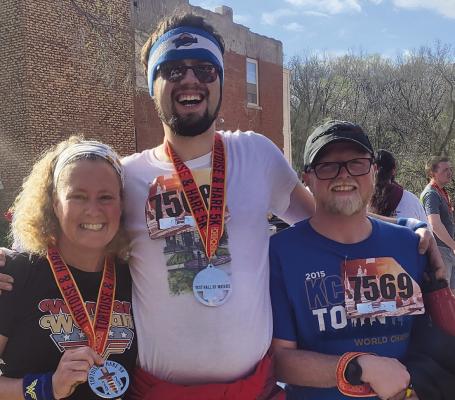 AFTER THE ANNUAL Good Samaritan Tortoise & Hare 5K race, Michelle Prindle, Robbie Farabee and Collin Alderman display their medals. SHARON DONAT | Staff