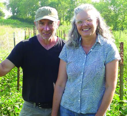 TOM RUGGIERI and Rebecca Graff discuss how the drought has affected their farm. ELIZABETH BARNT | Staff