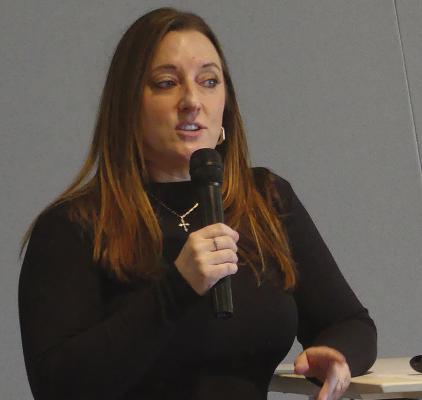 TIFFANY DANNEMAN, Excelsior Springs Hospital Director of Social Services, explains the importance of having a living will at the local senior center. ELIZABETH BARNT | Staff