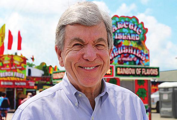 AFTER SPEAKING on Aug. 19 at the Farm Bureau Building at the Missouri State Fair, and then crossing the street to the fair’s Pork Place building, U.S. Sen. Roy Blunt is ready to continue visiting with people on the fairgrounds. J.C. VENTIMIGLIA | Staff