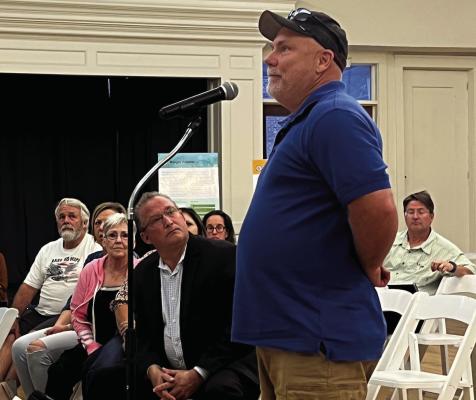 DOUG HAUSER, an Excelsior Springs resident who lives near the railroad tracks, voices his concerns during a Sept. 14 public forum at The Montgomery Event Venue that a railroad merger will bring additional train traffic to Excelsior Springs. SOPHIA BALES | Staff