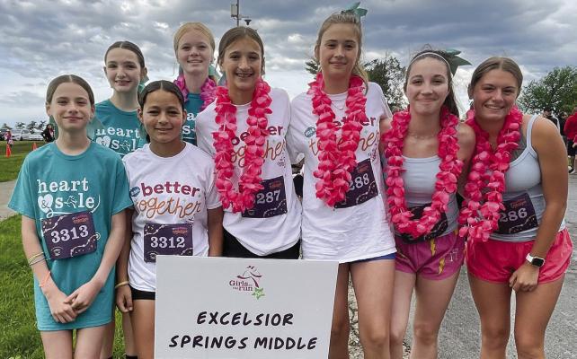 EXCELSIOR SPRINGS Middle School students Layla Hudson (from left), Lexy Martin, Cassie Wenz, Haleigh McCray, Reese Ryan, Libby Ringenberg, Luna Bigham and Addi Lingle participate in the Girls on the Run 5K in Kansas City. The Girls on the Run non-profit organization inspires young ladies to be joyful, healthy and confident. Submitted