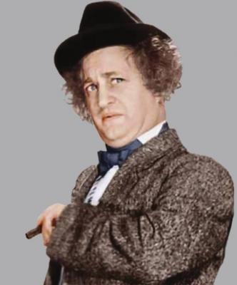 COMEDIAN Larry Fine of The Three Stooges played a cigar box instrument.