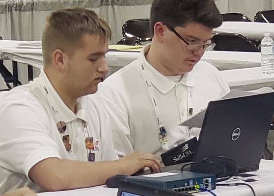 Skylar Arner and Jacob Goodman from Excelsior Springs compete in the cybersecurity SKillsUSA competition in Atlanta, Georgia. BRIAN SMARKER, SkillsUSA | Submitted