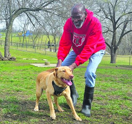DON FARROW and his dog, Neptune, enjoy the weather by visiting Century Bark. “I love the city of Excelsior Springs and all the great things that come with it,” said Farrow. “The Community Center, this amazing dog park and all the other amenities show how beautiful this town is.” MIRANDA JAMISON | Staff
