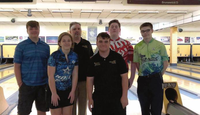 BOWLERS EARNING scholarship money are, front row, from left, Sydney Whitfield and Josh Oldham; and back row, Ryan Gluhm, Austin Rucker and Nicholas Hays. Also pictured is coach Dewayne Day.
