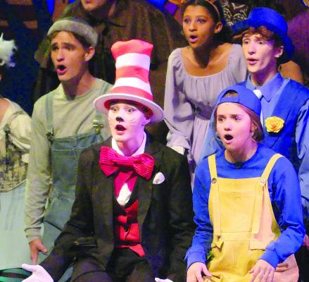 PORTRAYING DR. SEUSS characters Mac Morris (left), Em Rice as the Cat in the Hat and Abby Rash sing in the Excelsior Springs High School production of “Seussical the Musical.” ELIZABETH BARNT | Staff