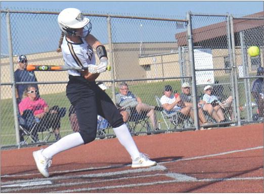 EXCELSIOR SPRINGS sophomore Bella Loeffert keeps her bat level and her eyes on the ball as she swings at a pitch Aug. 29 during the Tigers’ meeting with William Chrisman at Miracle Field. DUSTIN DANNER | Staff