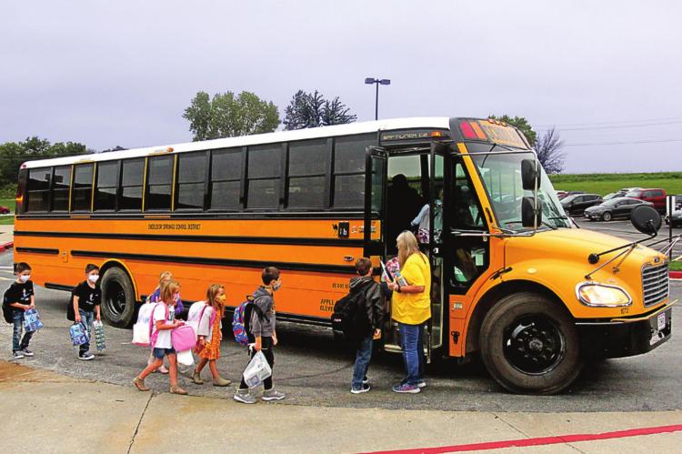 CHILDREN at Westview Elementary School get onto the school bus. J.C. VENTIMIGLIA | Staff