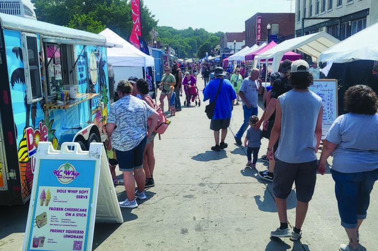 SHARON DONAT | Staff Crowds take to the streets to shop various vendors during the festival.