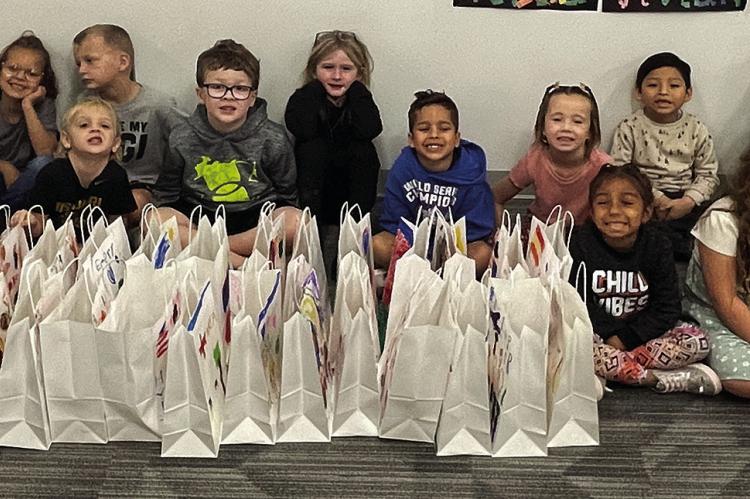 READY FOR delivery to the Clay-Ray Veterans’ Association, Cornerstone Elementary kindergartners are excited to present their gift bags to the veterans. LINDA HASKELL | Submitted