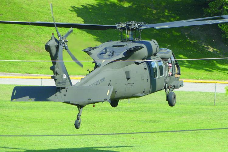 A US ARMY Black Hawk landing on Piburn Baseball Field for guests to tour.