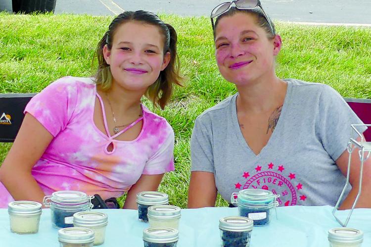 GRACE AND Amy Short, sell homemade sugar scrubs.