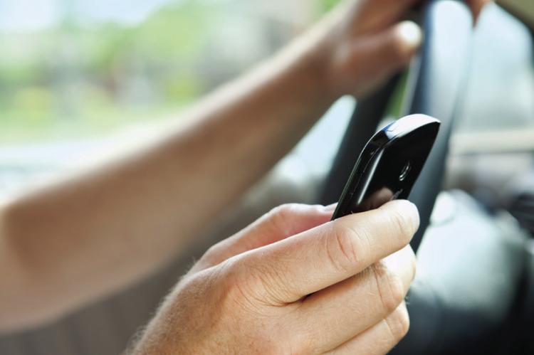 Law restricts drivers from phone