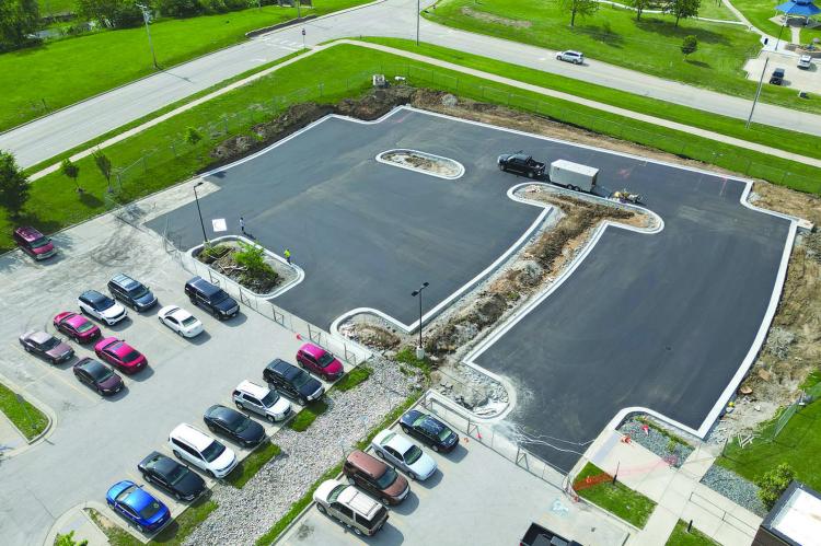THE EXCELSIOR SPRINGS Community Center’s additional parking lot takes shape.