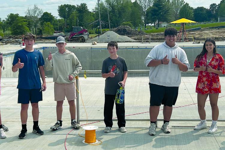 EXCELSIOR SPRINGS’ youth give a thumbs up in approval of the outdoor pool being constructed. COURTESY OF JESSE HALL, TAKEN BY SKYVUER IMAGERY | Submitted