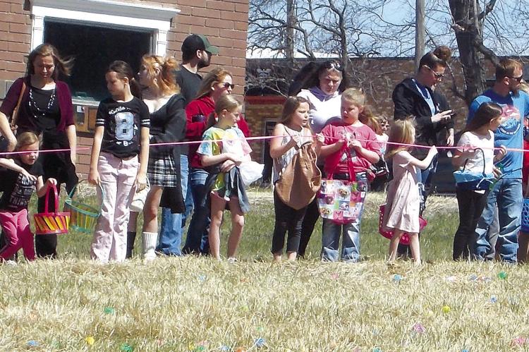 Excelsior Springs Wild Bunch hosted a 10,000 egg Easter Egg Hunt for children in the area. The free event was held for children ages 11 and younger. The Easter Bunny also stopped by and posed for photographs with children attending the event. See page 12 for photos. ELIZABETH BARNT | Staff