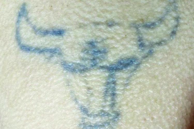 ANYONE RECOGNIZING this tattoo on the victim’s upper left arm is asked to call the TIPS Hotline.