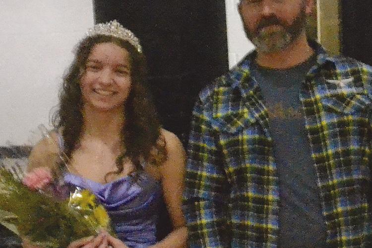 CROWNED FRESHMAN princess Madeleine Wenz (left) is escorted by her father, Russell Wenz.