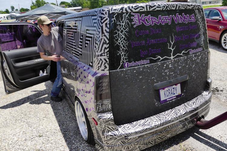 JARED GRAY explains that his car is custom designed with purple-tinted windows.
